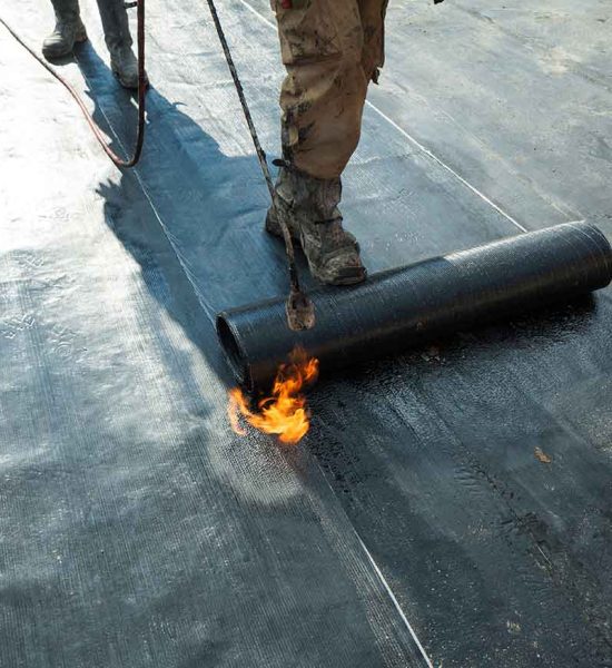 Installation of roll roofing waterproofing propane blowtorch dur